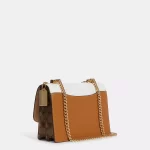 coach klare crossbody in blocked signature canvas