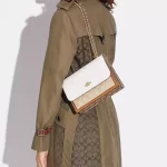 coach klare crossbody in blocked signature canvas