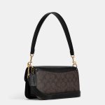 coach morgan shoulder bag in colorblock signature canvas with rivets