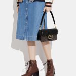 coach morgan shoulder bag in colorblock signature canvas with rivets