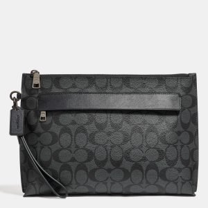 coach carryall pouch in signature canvas