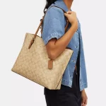 coach mollie tote in signature canvas