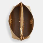 coach mollie bucket 22 in signature canvas