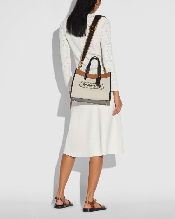 coach field tote 30 with coach badge