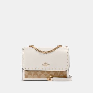 coach klare crossbody in signature canvas with rivets
