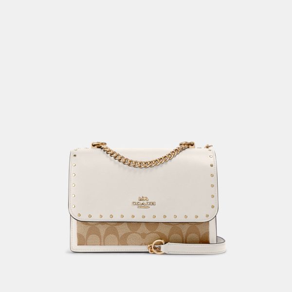 coach klare crossbody in signature canvas with rivets