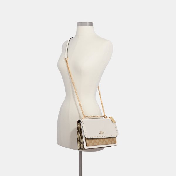 coach klare crossbody in signature canvas with rivets