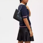 coach mini city tote in signature canvas with horse and sleigh