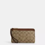 coach double zip wallet in signature canvas