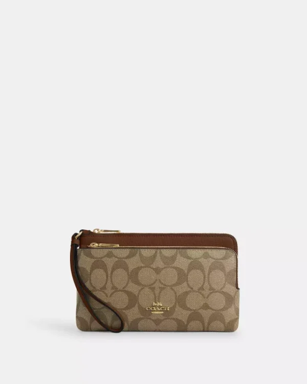 coach double zip wallet in signature canvas