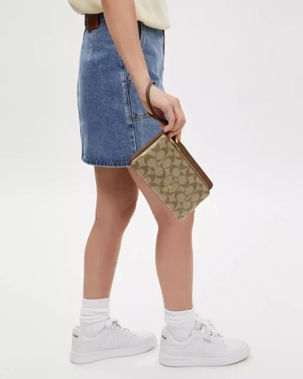 coach double zip wallet in signature canvas