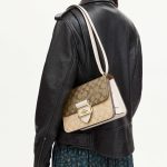 coach large morgan crossbody square in blocked signature canvas