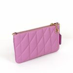 coach pouch bag with quilting