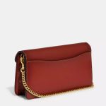 coach tabby chain clutch bag in signature canvas