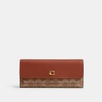 coach mila long flap wallet in signature canvas