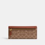 coach mila long flap wallet in signature canvas