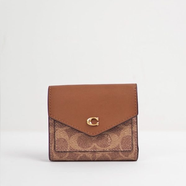 coach mila small flap wallet in signature canvas