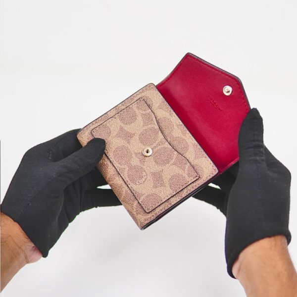 coach mila small flap wallet in signature canvas