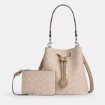 coach rowan bucket in signature canvas